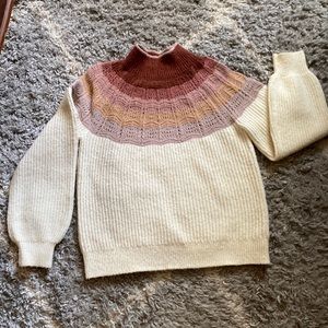 Maurice’s size L sweater earth tones above a cream body never been worn no flaws